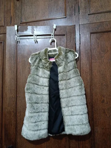 Vendo colete de pelo novo