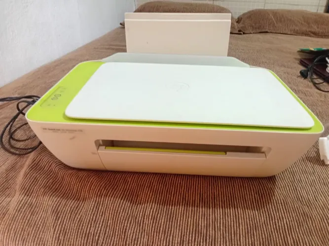 Impressora hp deskjet 2136 com  defeito