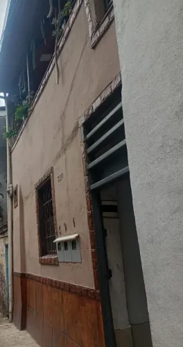 Vendo terreno com 3 casas