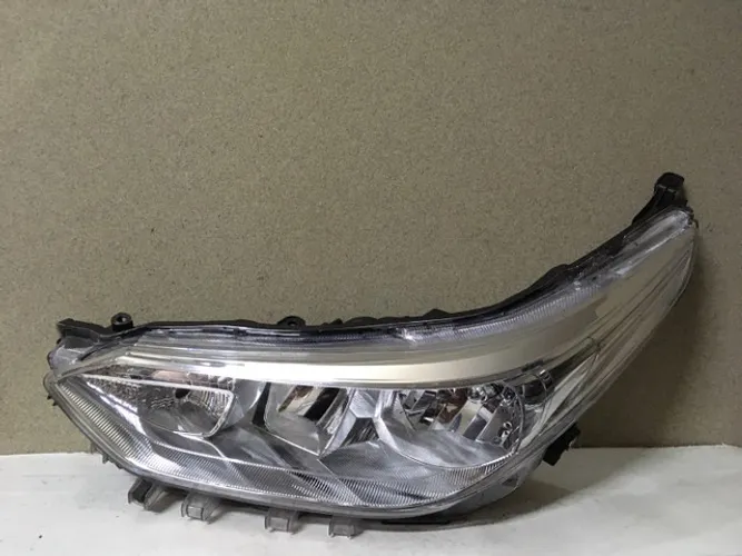 Farol Toyota Yaris (elétrico ) esquerdo motorista