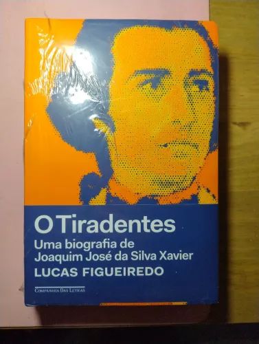 O Tiradentes. Uma Biografia de Joaquim José da Silva Xavier - Lucas Figueiredo. LACRADO!
