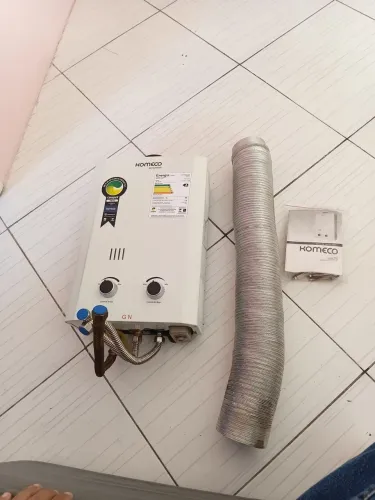 AQUECEDOR KOMECO SLIM ,VAZÃO DE 7LITROS POR MINUTOS.