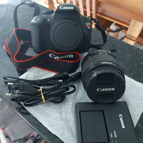 Canon EOS Rebel T5 + lente 18-55mm iii kit<br>