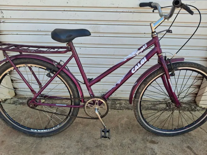 Vendo essa linda bicicleta poti caloi em perfeito estado 245 e entrego * chama