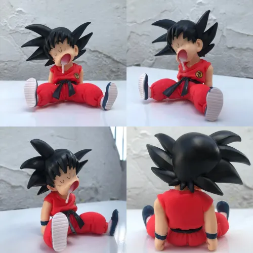 DRAGON BALL GOKU PEQUENO TIRANDO UM COCHILO, 10CM UMA LINDA PEÇA.