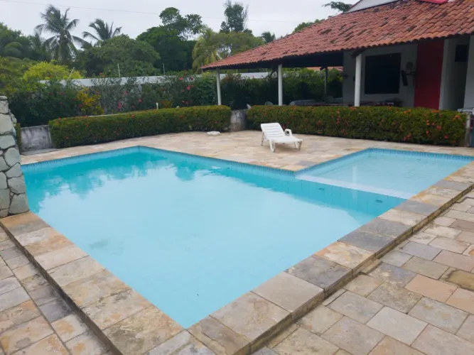 Casa Ampla no Bosque Rio Mar 500m da Praia e do Rio 6 Quartos | Área de Lazer Completa!