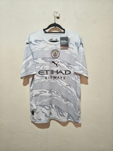 Camisa do Manchester City, G
