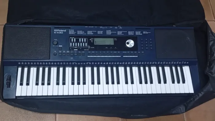 VENDO TECLADO MARCA ROLAND EX 30