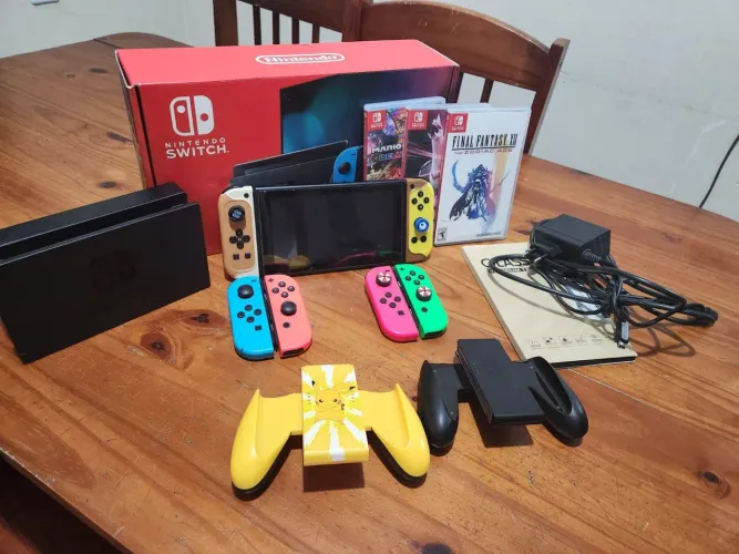 Nintendo Switch + 3 pares de controles + 3 jogos