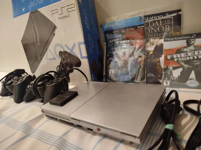 PlayStation 2 na caixa leitor funcionando normal