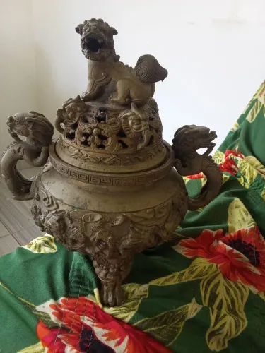 Insensato em bronze formato dragão chineis