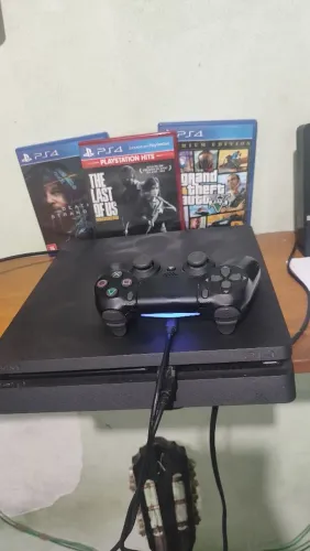 Vendo ou troco PS4 slim 1tb + 3 jogos + 1 controle com drift e "L2" com mal contato