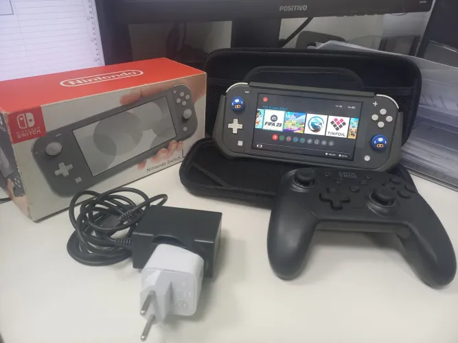 Nintendo Switch Lite Desbloqueado 32gb +64gb, com caixa, carregador e controle data frog 