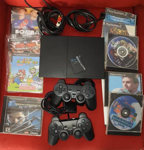 Playstation 2 slim. Desbl. Leitor 100%. Dois controles. 10 jogos.