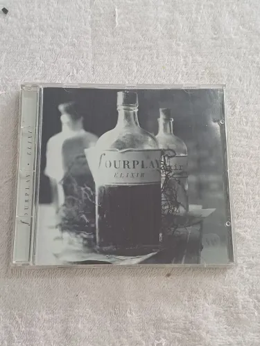 CD do álbum Elixir da banda de jazz Fourplay