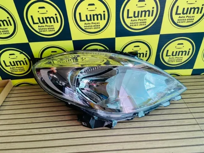 Farol Nissan Versa 2011/2014 Cromado - NOVO
