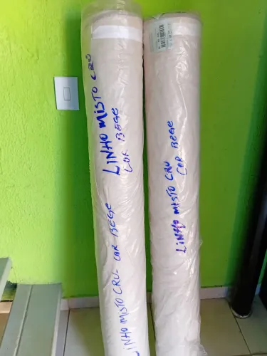 Tecido Linho Misto liso na cor bege cru- Rolo com 60 metro=300,00 cada.