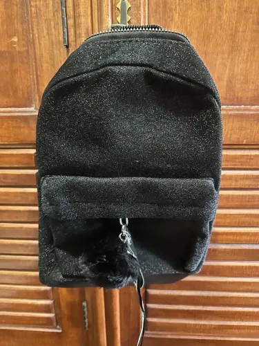 mochila média com glitter
