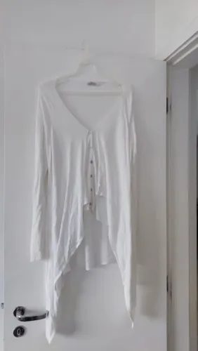 Blusa Alongada Maria Filo.Tamanho G.Em Tricô em malha.Busto51cm;46cm Altura