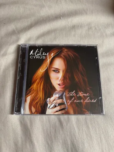Miley Cyrus - The time of our lives (importado)