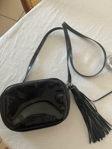 Bolsa Schütz com Marcas de Uso 