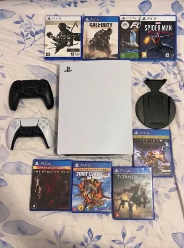 Playstation 5 completo com 13 jogos,2 controles,suporte pra o ps5, caixa.