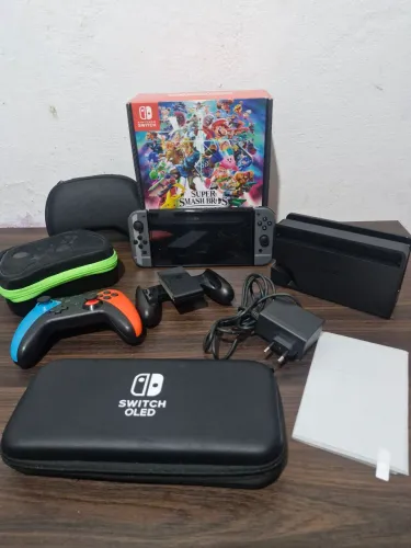 Nintendo Switch OLED Desbloqueado - Super Smash Bros + MicroSD 256gb + Controle + Bolsas