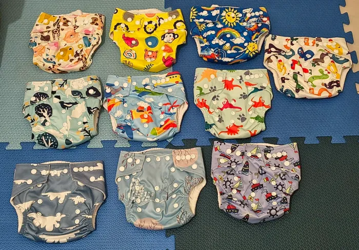 kit 10 fraldas ecológicas babyland com 20 absorventes