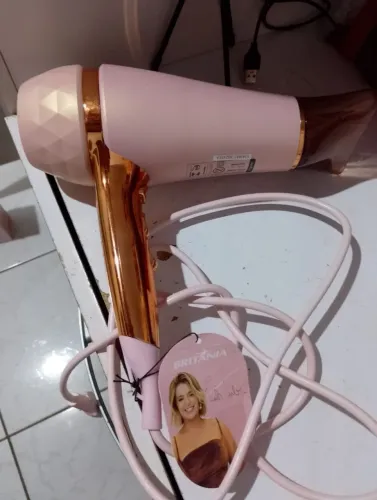 Secador de cabelo com defeito