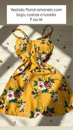 Vestido floral amarelo com bojo e costas trançada