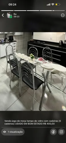 Vendo mesa com tampo de vidro com 5 cadeiras usada