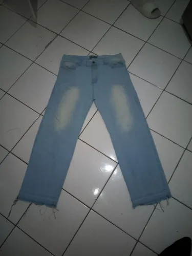 Calça baggy Dazzling com barra cortada/aberta