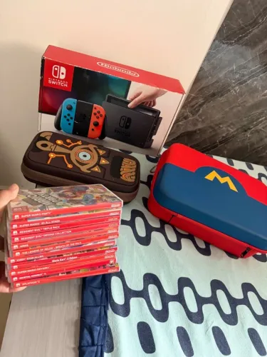 Nintendo Switch V1 2018 + 10 jogos + controles e acessórios