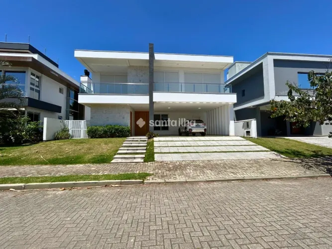 Casa com 5 dormitórios sendo 4 suítes para vender ou alugar, 417,27m², Rio Tavares - Flori