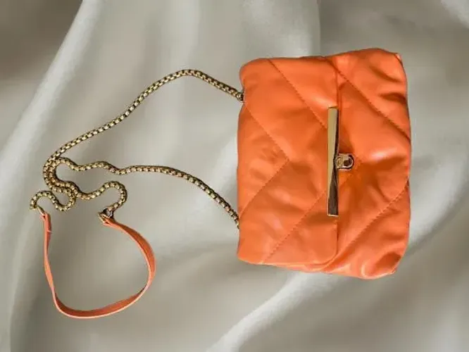 Bolsa tira colo