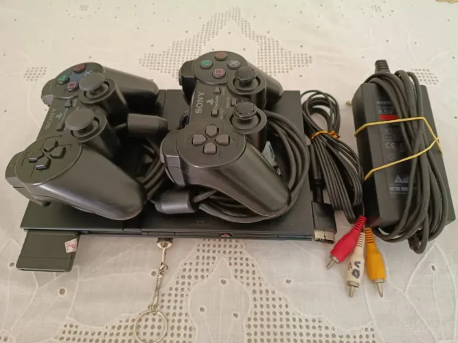 PlayStation 2 + 42 jogos + 2 controles + todos os cabos