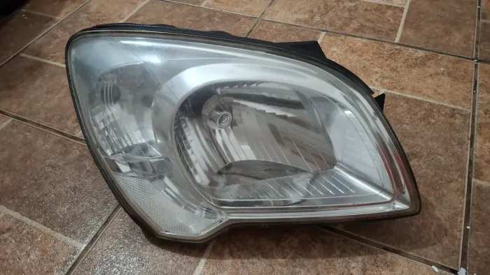 Farol original Esporteg Ex ( lado direito)