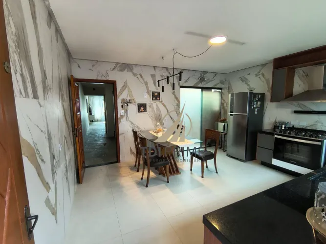 Sobrado com 4 dormitórios para alugar, 210 m² por R$ 8.000/mês - Olímpico - São Caetano do