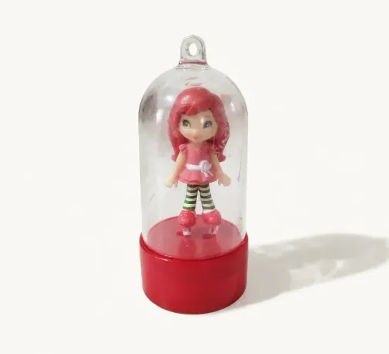 Mini boneca da Moranguinho com carimbo promocional da Nestlé