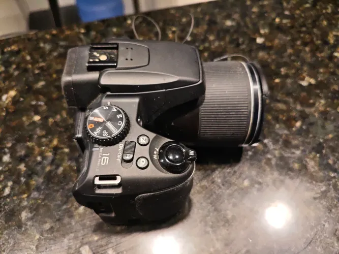 Fujifilm Finepix Sl1000 leia a descrição