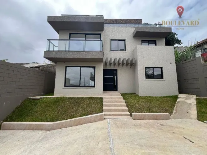Sobrado novo em condomínio fechado com 3 dormitórios à venda, 165 m² por R$ 1.290.000 - Ub