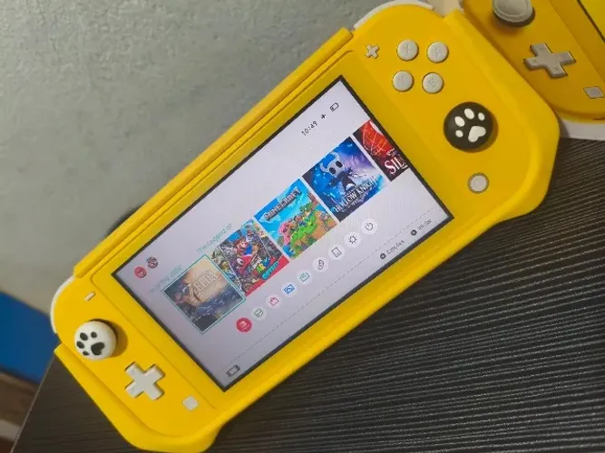 NINTENDO SWITCH LITE DESBLOQUEADO+ CARTÃO SD 64 GB