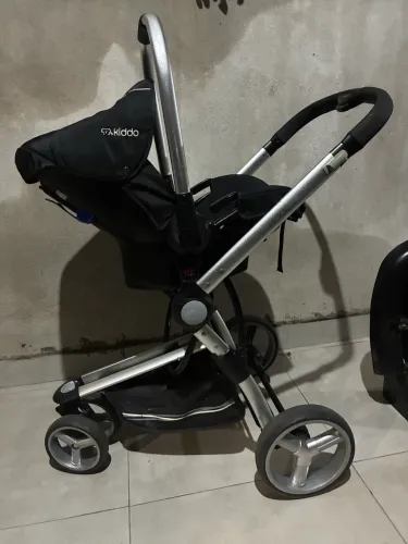 Carrinho e bebê conforto