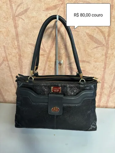 Bolsa de couro legítimo com avaria