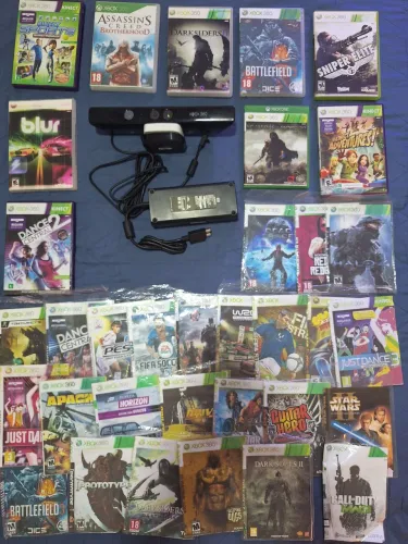 Kinect e fonte de energia mais 34 jogos do Xbox 360.