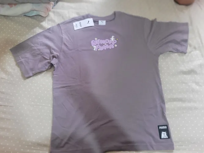 Puma x Ripndip roxa com uma estampa gráfica central