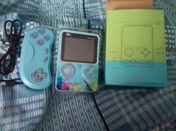Mini game portátio G5 com jogos retro + controle + saída para TV