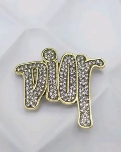 Broche Dior Dourado