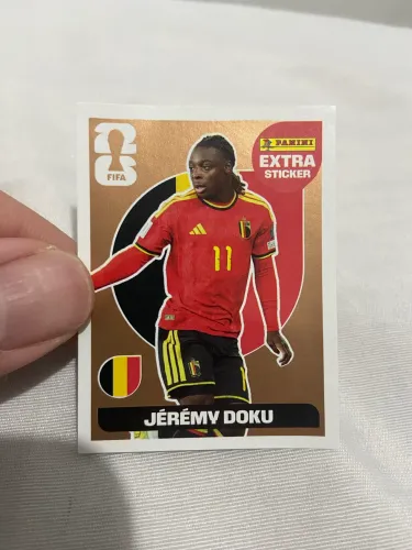 Figurinha extra sticker Jérémy Doku bronze.