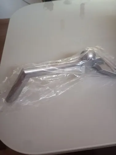 Raspador/limpador para chapa de lanches.